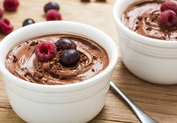 Chocolate mousses topped with berries