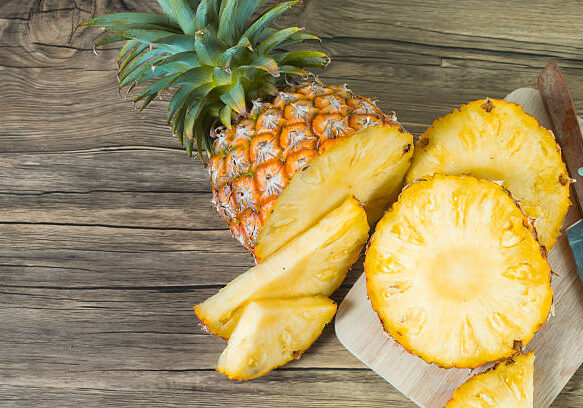 pineapple on the wood texture background